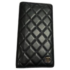 Porte- carnets de notes CHANEL en cuir d'agneau noir