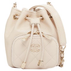 CHANEL nude caviar leather quilted CC pocket bucket crossbody chain bag
