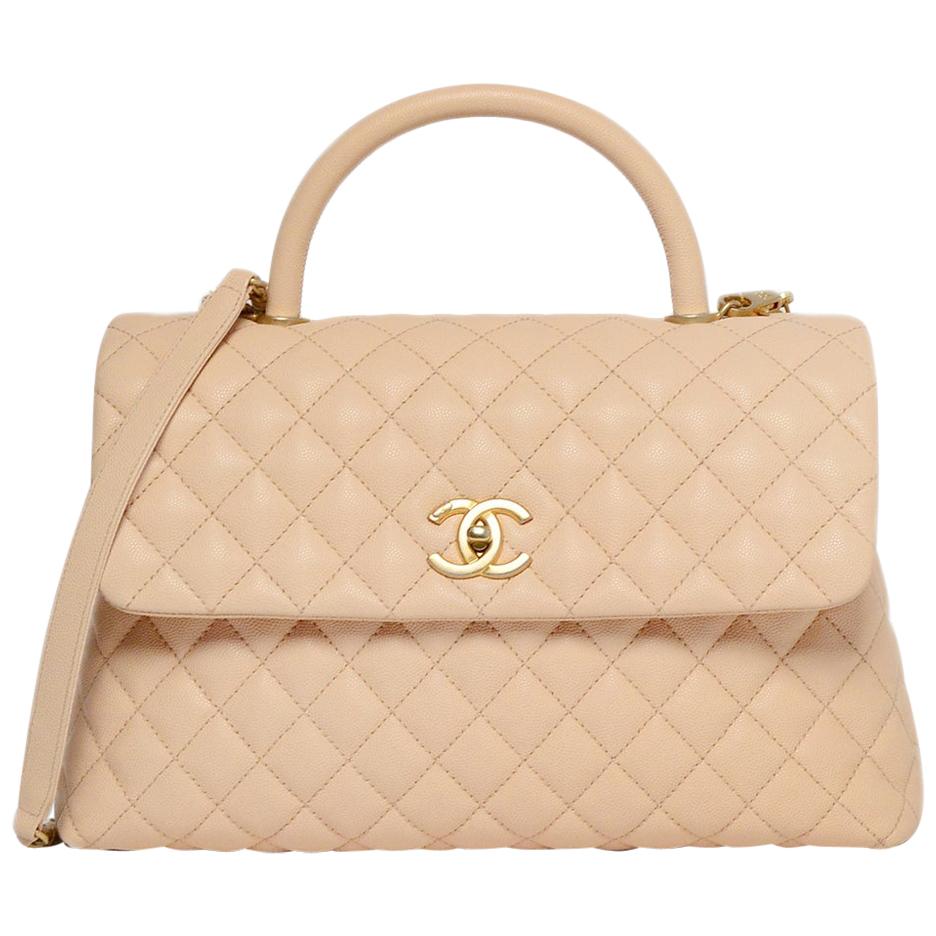 Chanel Nude Caviar Leather Quilted Medium Coco Handle Kelly Style Flap Bag  For Sale at 1stDibs | coco chanel nude, chanel coco nude, kelly coco nude