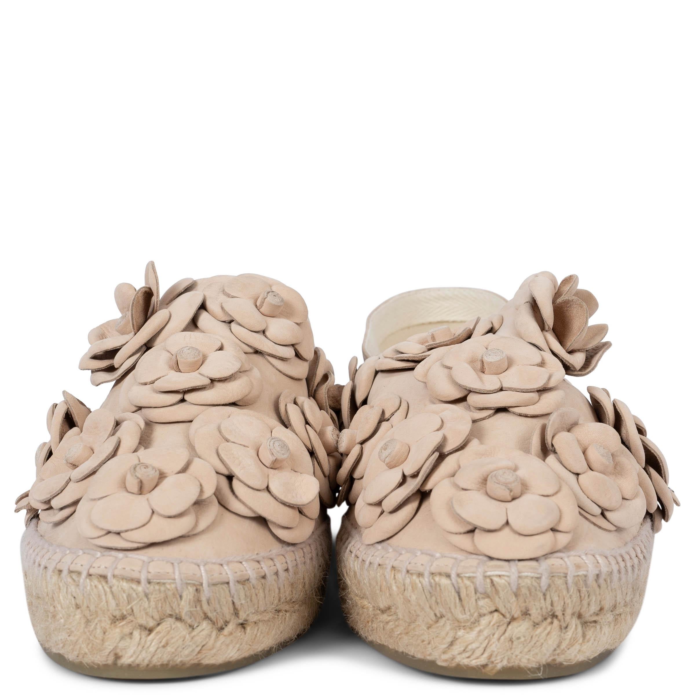 100% authentic Chanel 2017 Cuba espadrilles in nude nubuck leather embellished with tonal Camellia blossoms. Lined in ecru leather. Brand new without dust bags or box.

Measurements
Model	17C G29904 X52016 OF716
Imprinted Size	42
Shoe Size	41
Inside