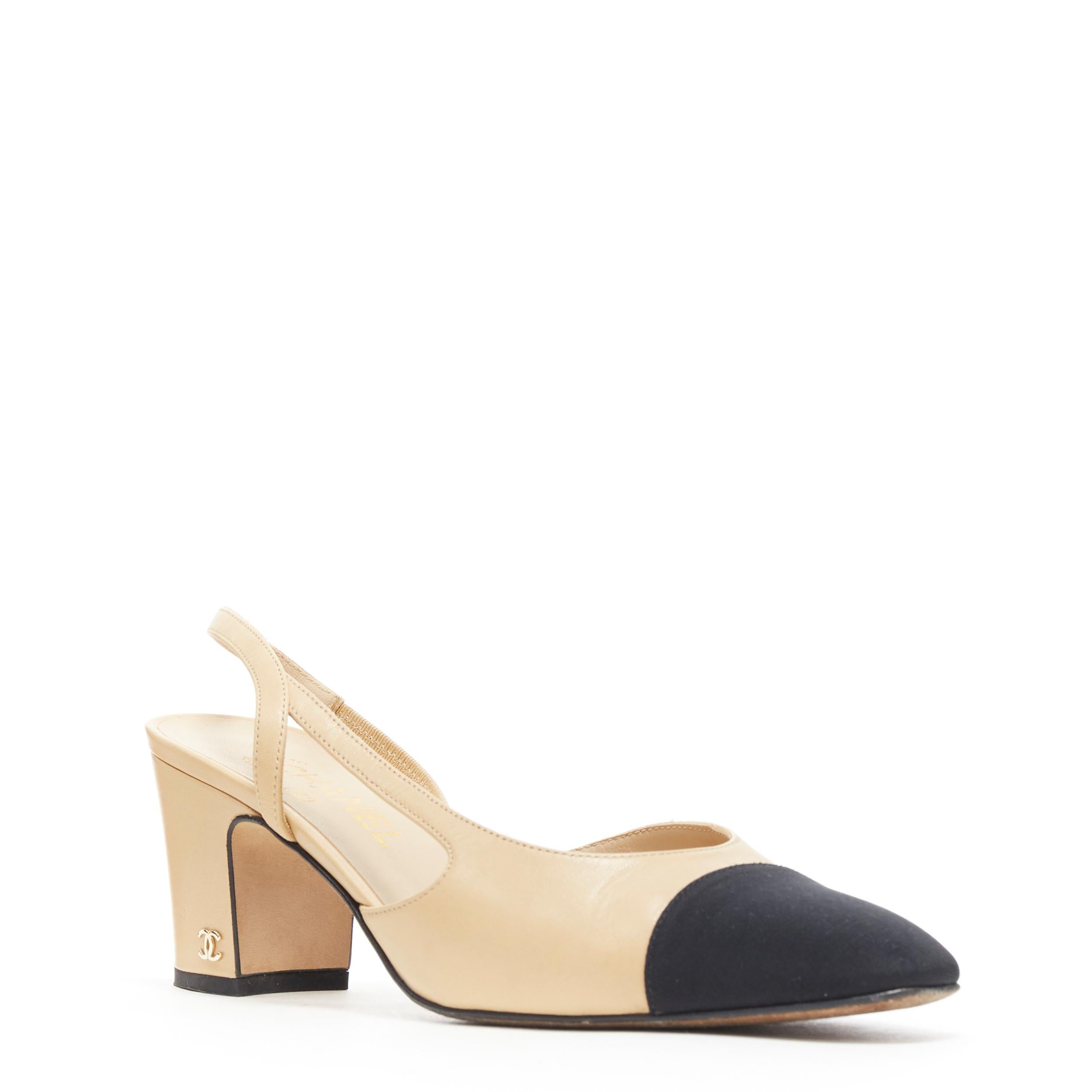 CHANEL nude leather black grosgrain toe cap CC logo block heel slingback EU39 C
Brand: Chanel
Designer: Karl Lagerfeld
Model Name / Style: Slingback pump
Material: Leather
Color: Beige
Pattern: Solid
Extra Detail: Mid (2-2.9 in) heel height. Almond