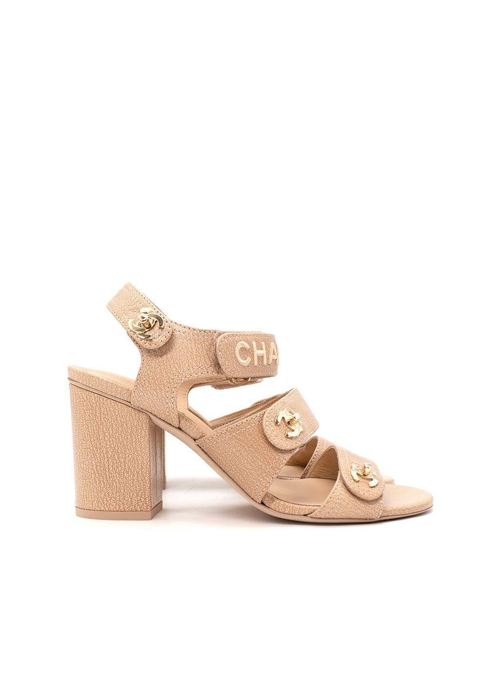 Chanel Nude Leather CC Velcro Strap Block Heeled Sandals

- Dad-style sandals with 3 foot straps, 1 velcro, and 2 featuring the signature CC twistlock
- Logo embroidered
- Set on mid-height block heel
- Leather lined, leather