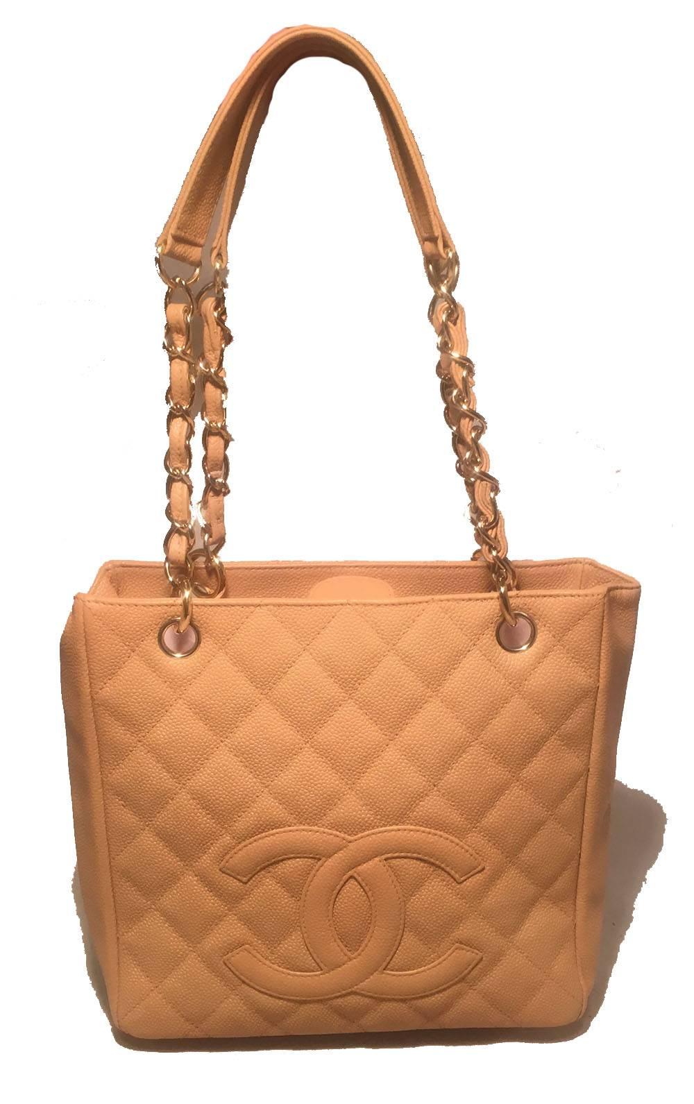 Beautiful Chanel Nude Quilted Caviar Leather Medium Shopping Tote in excellent condition.  Quilted nude caviar leather exterior with signature CC logo along front side.  shining gold hardware and woven chain and leather shoulder straps.  Top snap