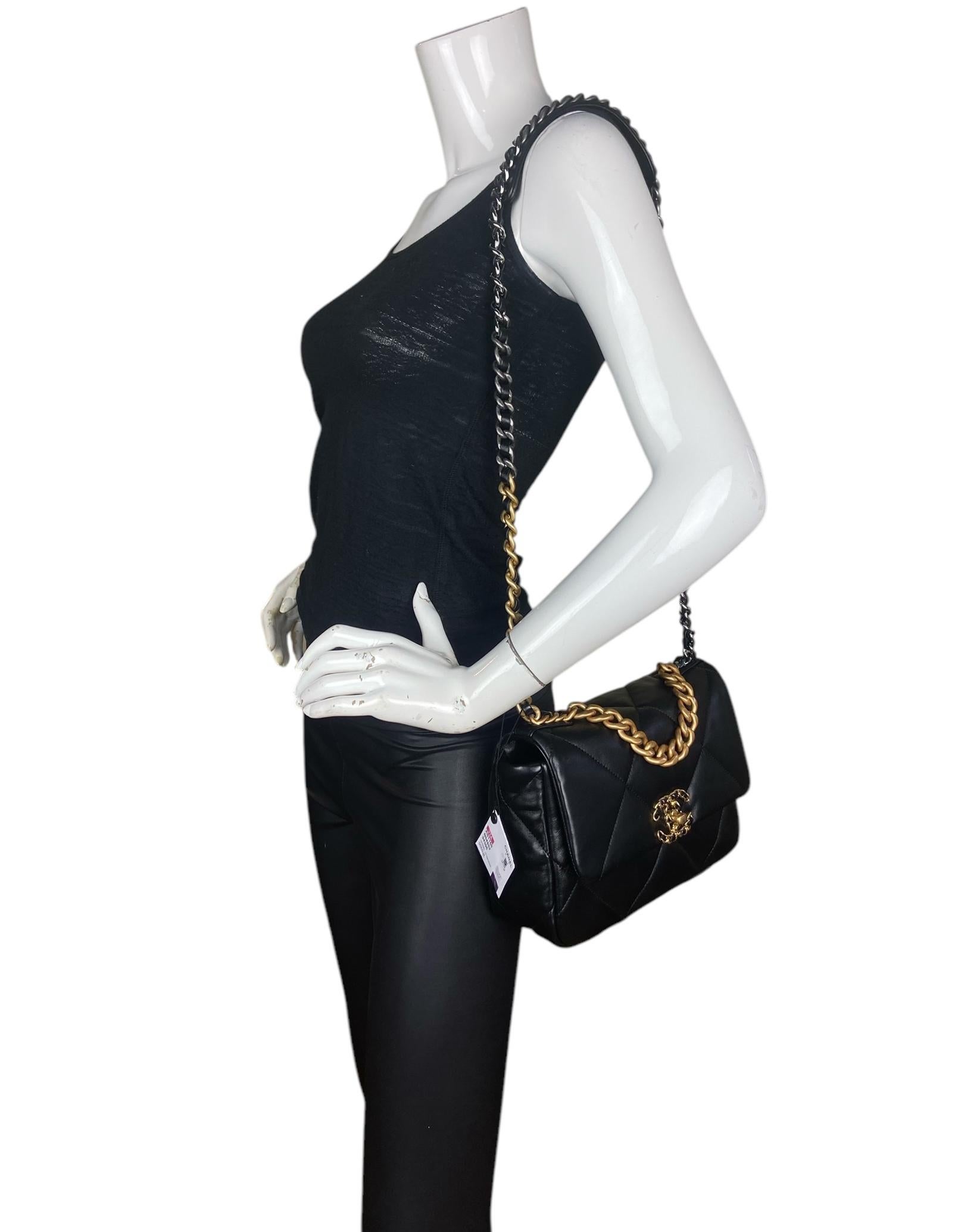 Chanel NWT Black Lambskin Quilted Medium 19 Bag

Made In: Italy
Year of Production: 2023
Color: Black
Hardware: Matte silvertone, shiny silvertone, matte goldtone, ruthenium, and dark silver
Materials: Leather, metal
Lining: