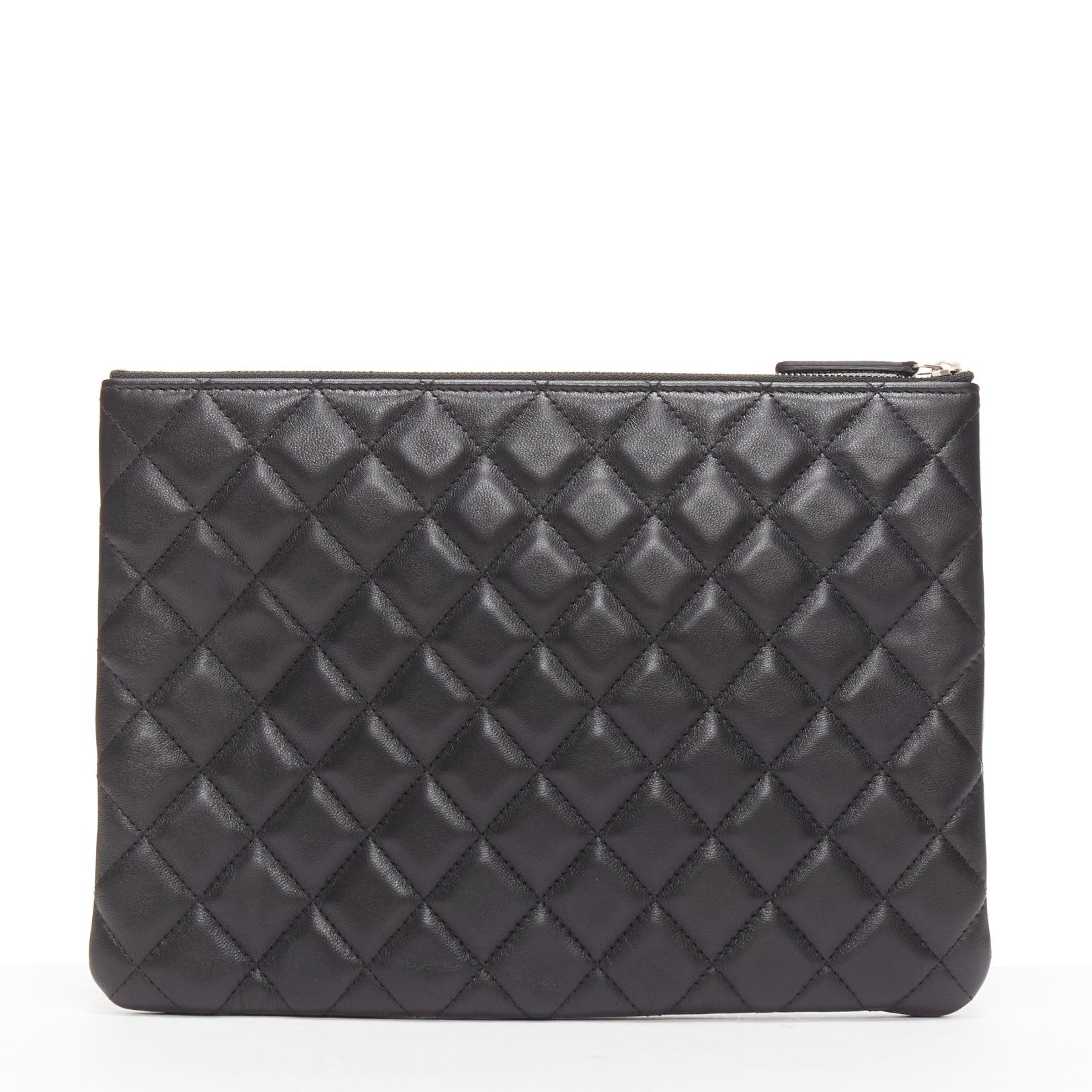 Women's CHANEL O Case black smooth leather matelasse quilted zip clutch bag