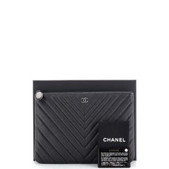 Chanel O Case Clutch Chevron Sheepskin Medium