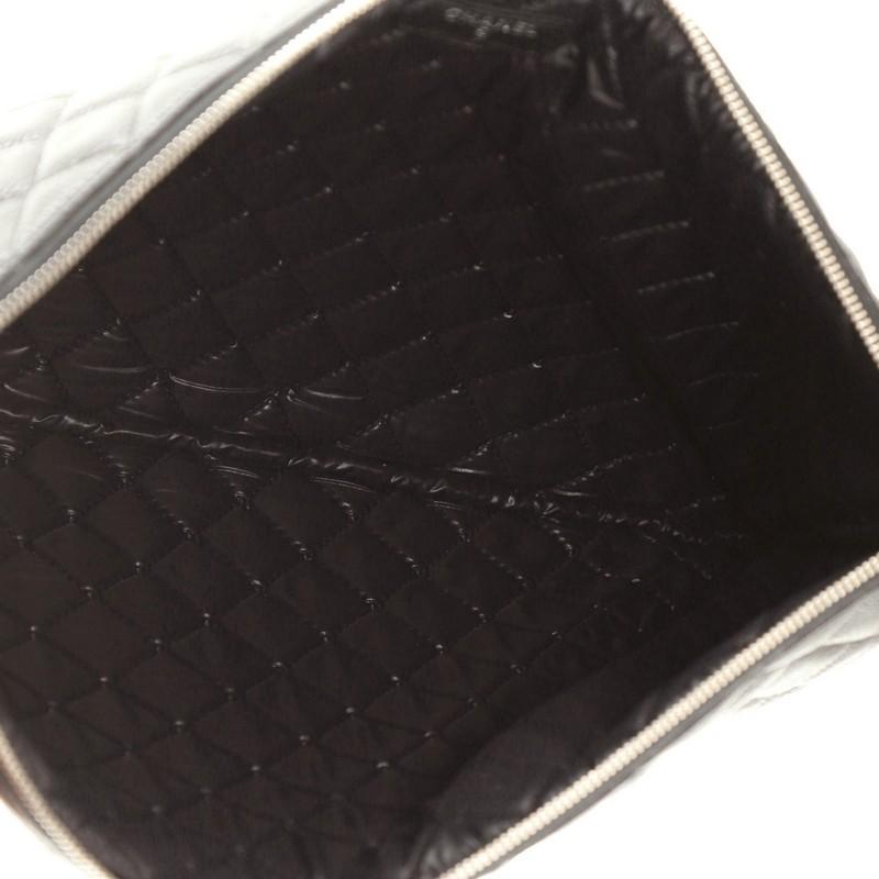 Women's or Men's Chanel O Case Clutch Quilted Caviar Large