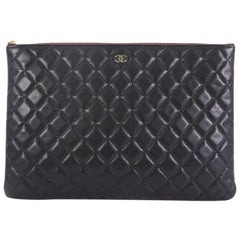 Chanel O Case Clutch Quilted Caviar Large