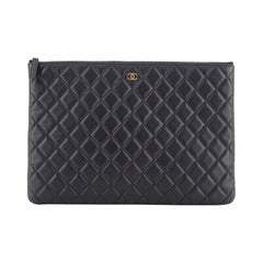 Chanel  O Case Clutch Quilted Caviar Large