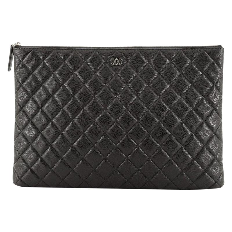 Chanel O Case Clutch Quilted Caviar Large