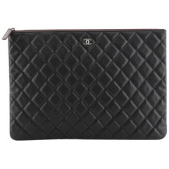 Chanel O Case Clutch Quilted Caviar Large