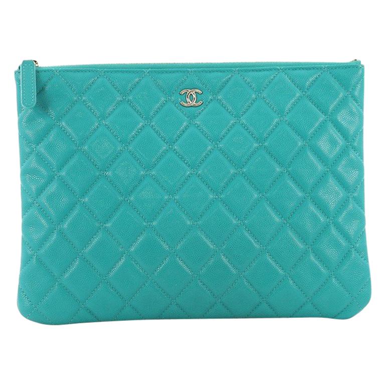 Chanel O Case Clutch Quilted Caviar Medium