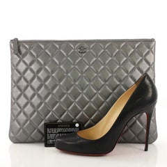 Chanel O Case Clutch Quilted Lambskin Large