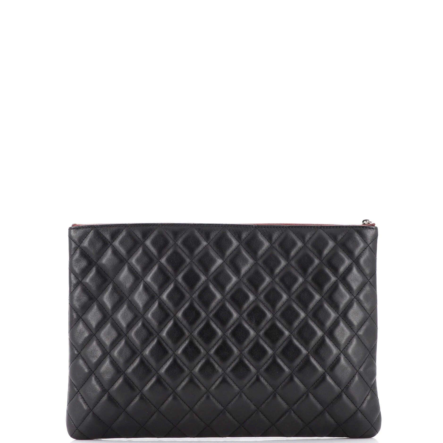 Women's Chanel O Case Clutch Quilted Lambskin Large