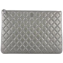 Chanel O Case Clutch Quilted Lambskin Large
