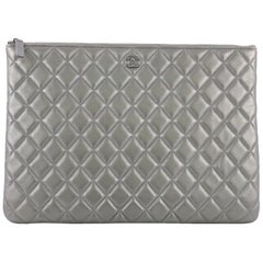 Chanel O Case Clutch Quilted Lambskin Large