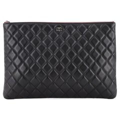 Chanel O Case Clutch Quilted Lambskin Large