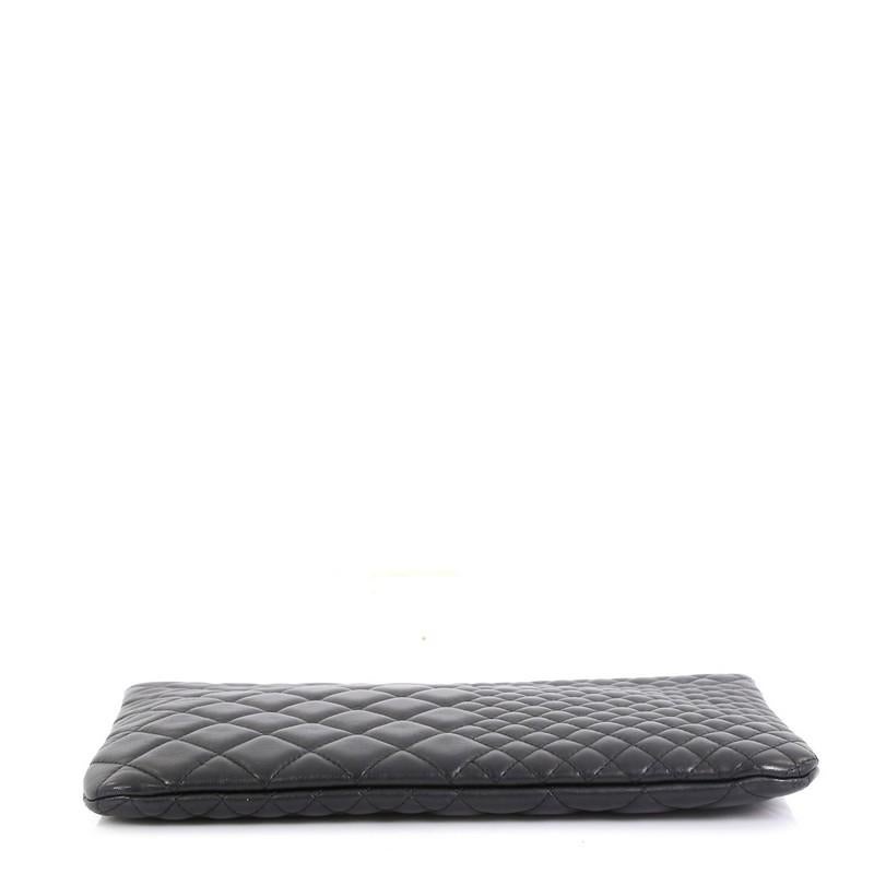 Women's or Men's Chanel O Case Clutch Quilted Lambskin Medium 