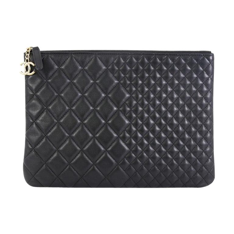 Chanel O Case Clutch Quilted Lambskin Medium 