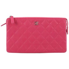 Chanel O Case Clutch Quilted Lambskin Small