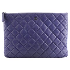 Chanel O Case Clutch Quilted Lambskin Small