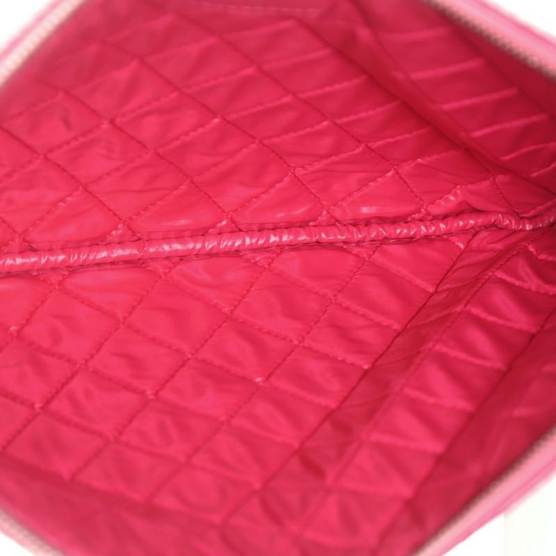 Women's or Men's Chanel O Case Clutch Quilted Perforated Lambskin Medium