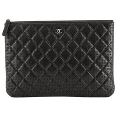 Chanel O Case Clutch Quilted Perforated Lambskin Medium