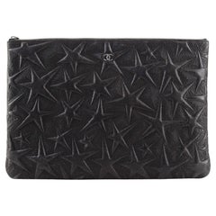 Chanel O Case Clutch Star Embossed Lambskin Large