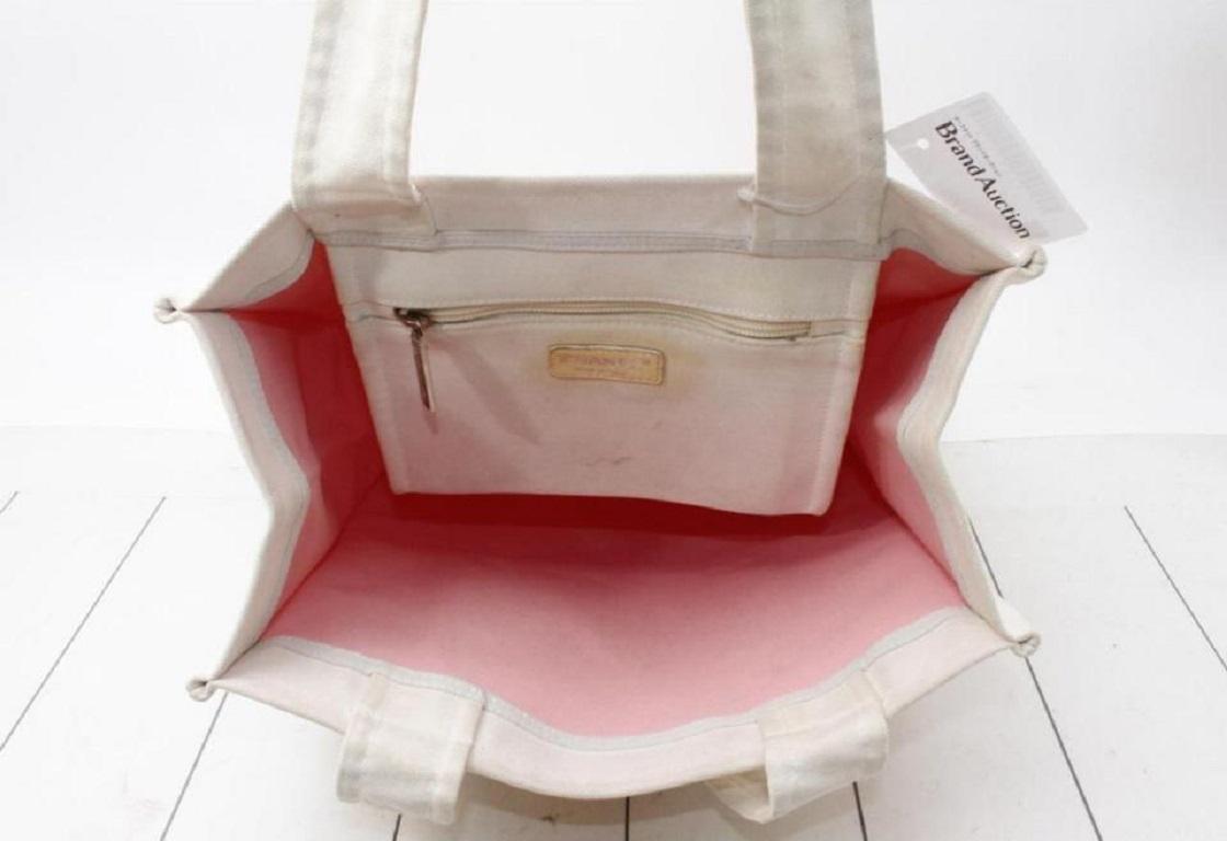 Fourre-tout Chanel blanc cassé avec logo CC 862125 Bon état - En vente à Dix hills, NY