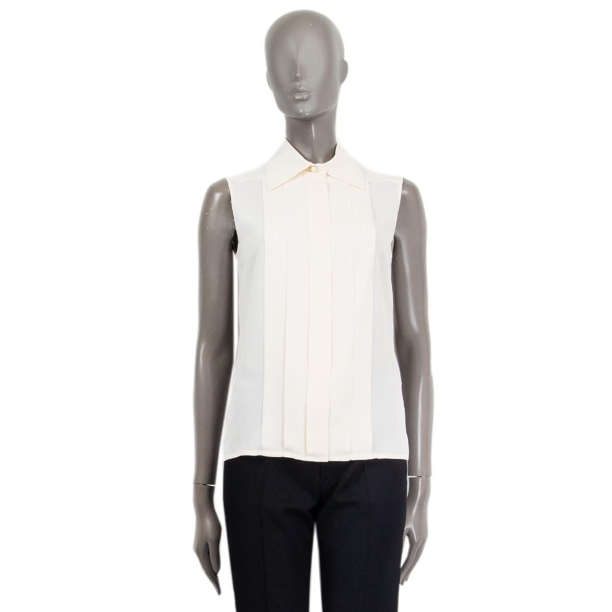 off white sleeveless blouse