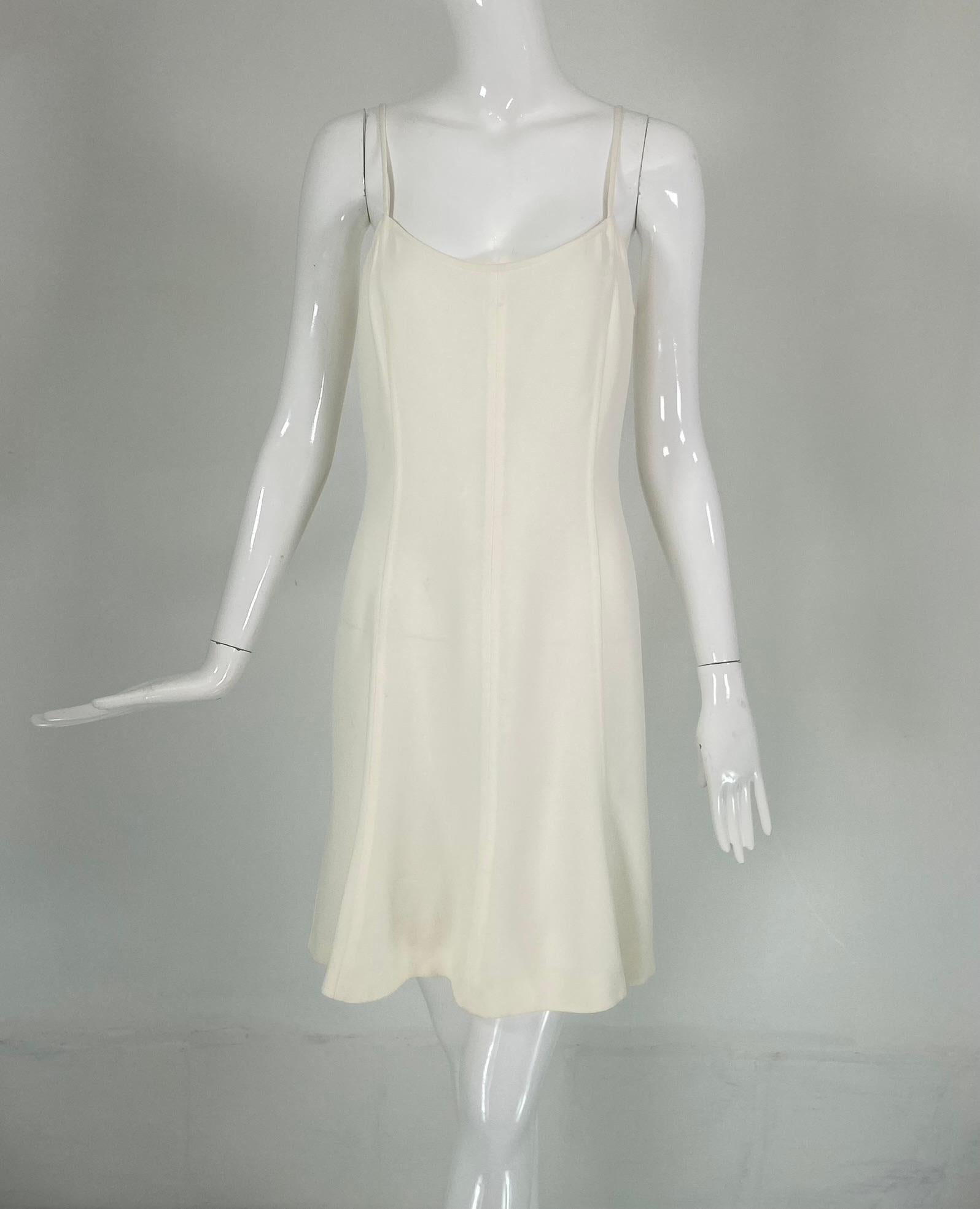 Chanel off white two piece spaghetti strap sun dress & tweed jacket 1994E. Princess seam spaghetti strap sun dress in textured cotton blend, fit & flair, fitted at the bust & through the waist, short skirt flares at the hem. Unlined, with finished