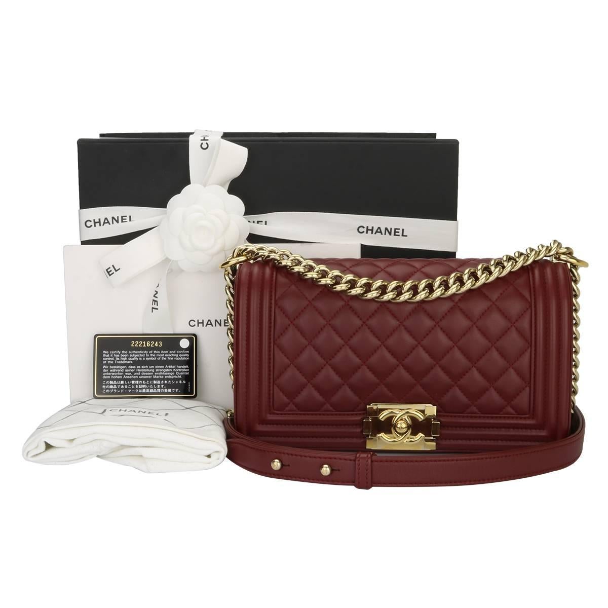 Authentic CHANEL Old Medium Quilted Boy Burgundy Lambskin with Shiny Gold Hardware 2015.

This stunning bag is still in excellent condition, the bag still holds its original shape and the hardware is still very clean and shiny.

Exterior Condition:
