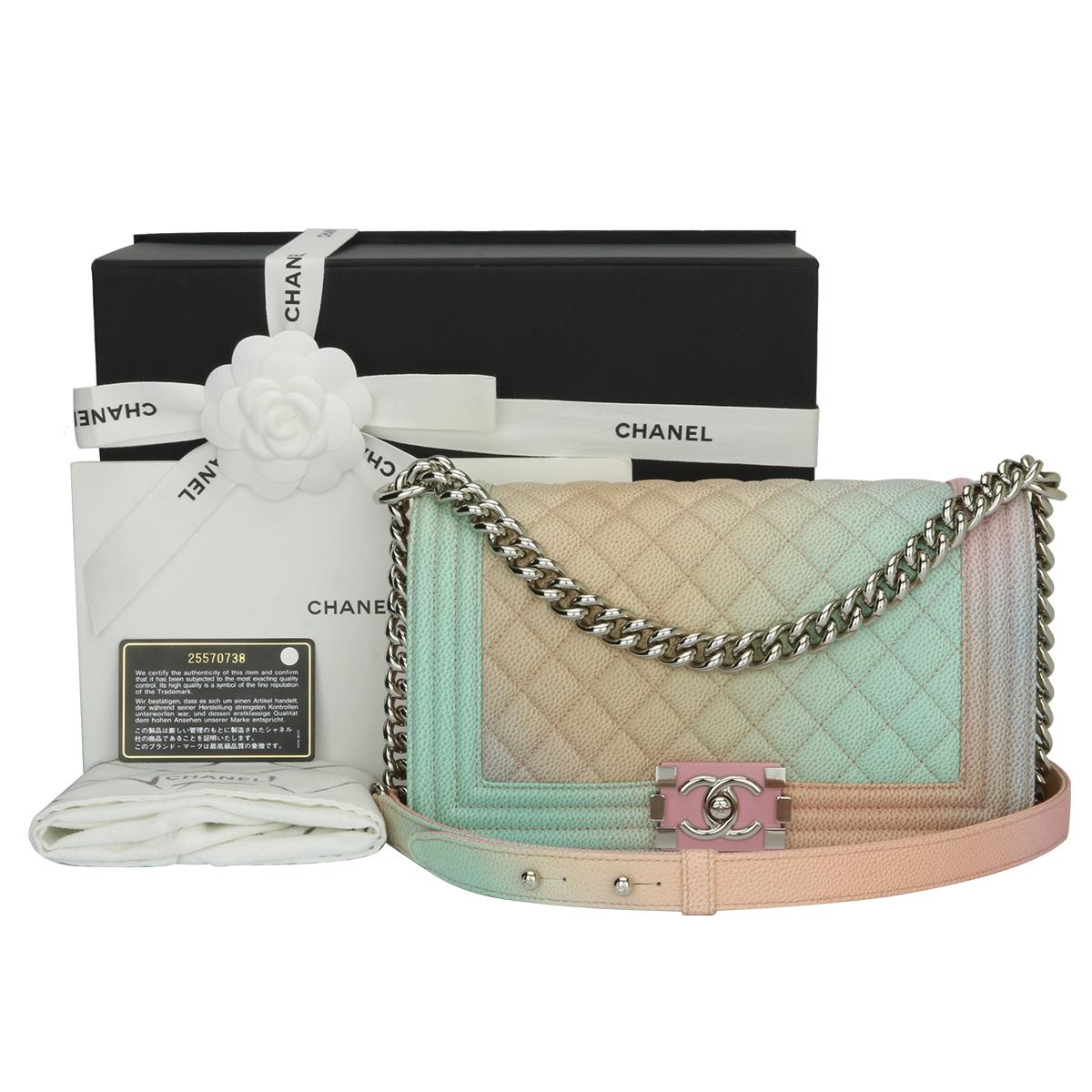 Authentic Chanel Old Medium Boy Bag Rainbow Caviar with Silver Hardware 2018.

This stunning bag is still in a pristine condition, the bag still holds its original shape and the hardware is still very clean and shiny.

Exterior Condition: corners