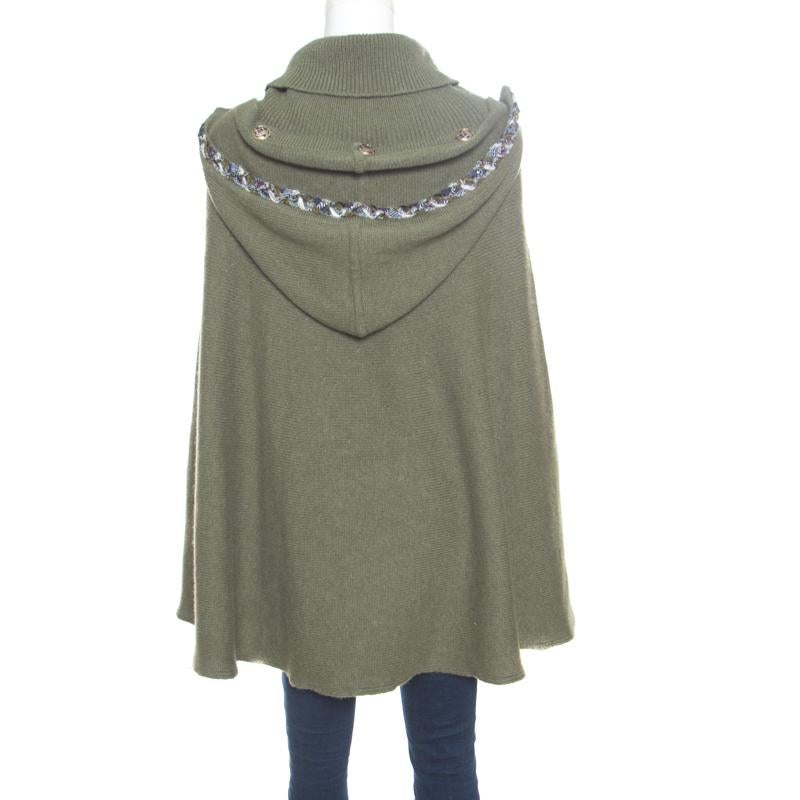 Our hearts have gone to this fashionable poncho from Chanel! It comes made from cashmere and designed with tweed trims, a turtle neck, slots for the hands, and a hood. For a high-fashion look, team it with leather leggings and pointed-toe ankle