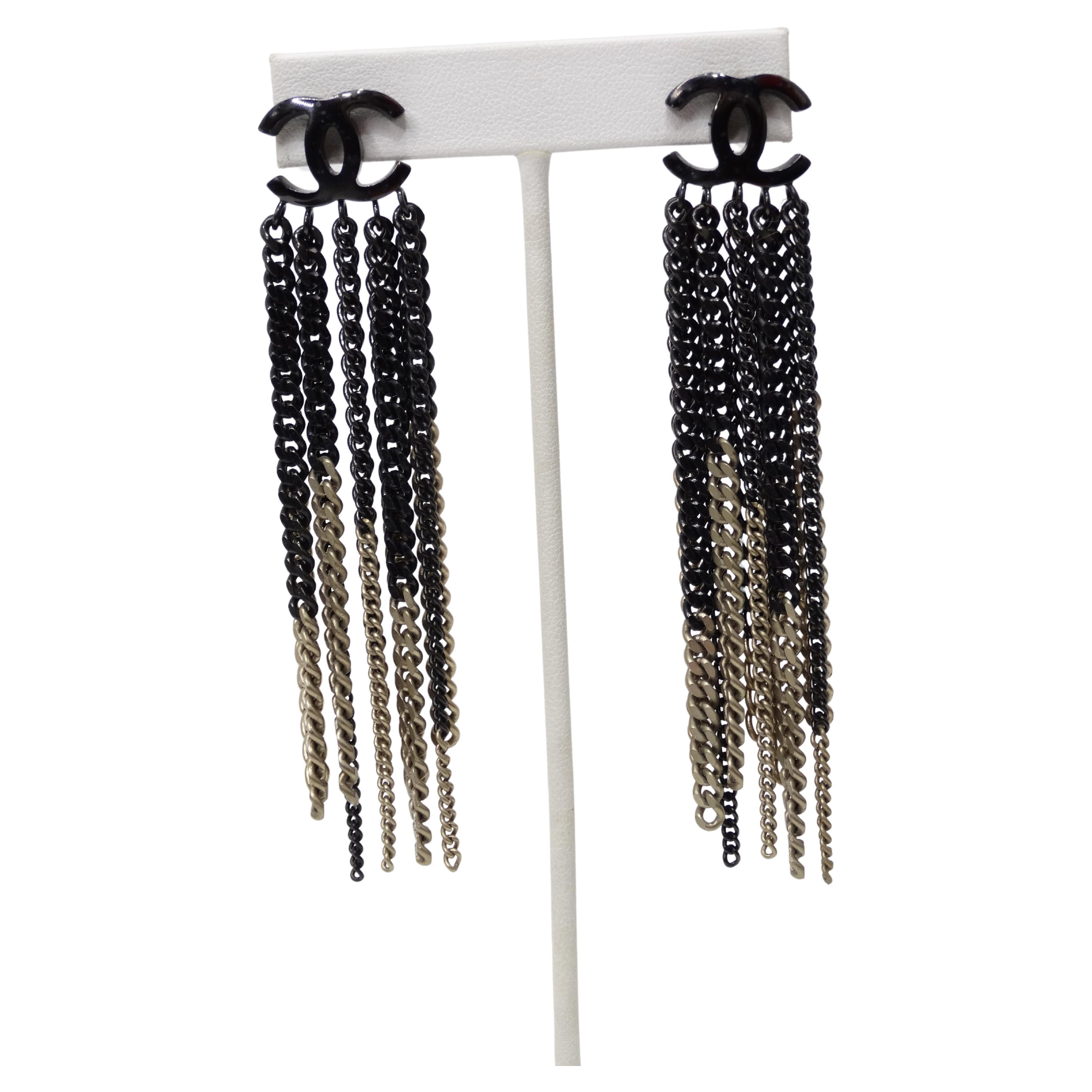 From the Pre-Fall 2014 Collection by Karl Lagerfeld, upgrade your simple Chanel CC earrings to these fun and edgy pair perfect for a night out! These are a very rare piece of Chanel to add to your collection today. You will not be able to find these