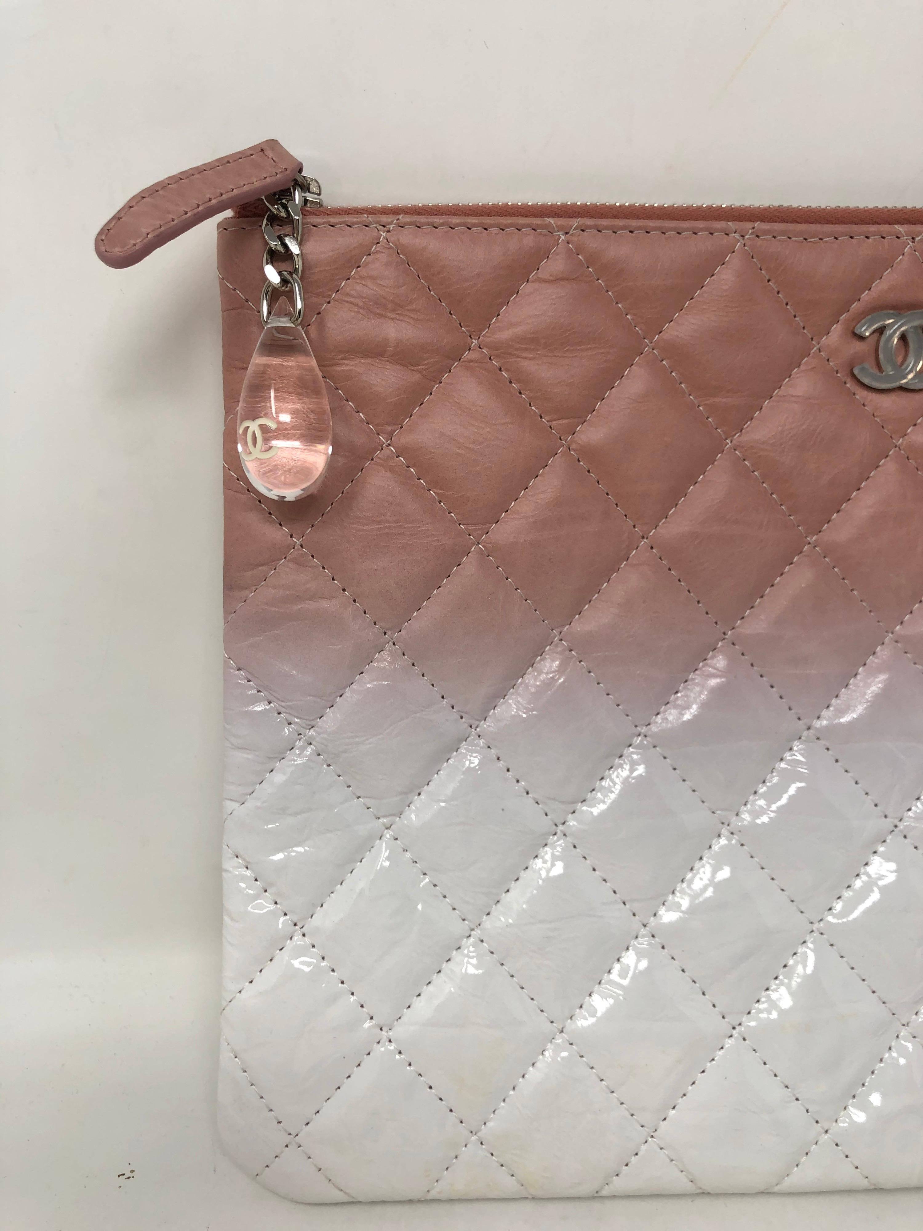 Chanel Ombre Pink and white clutch. Beautiful graduated color clutch. Mint like new condition. Lucite pull. Includes authenticity card. Guaranteed authentic. 