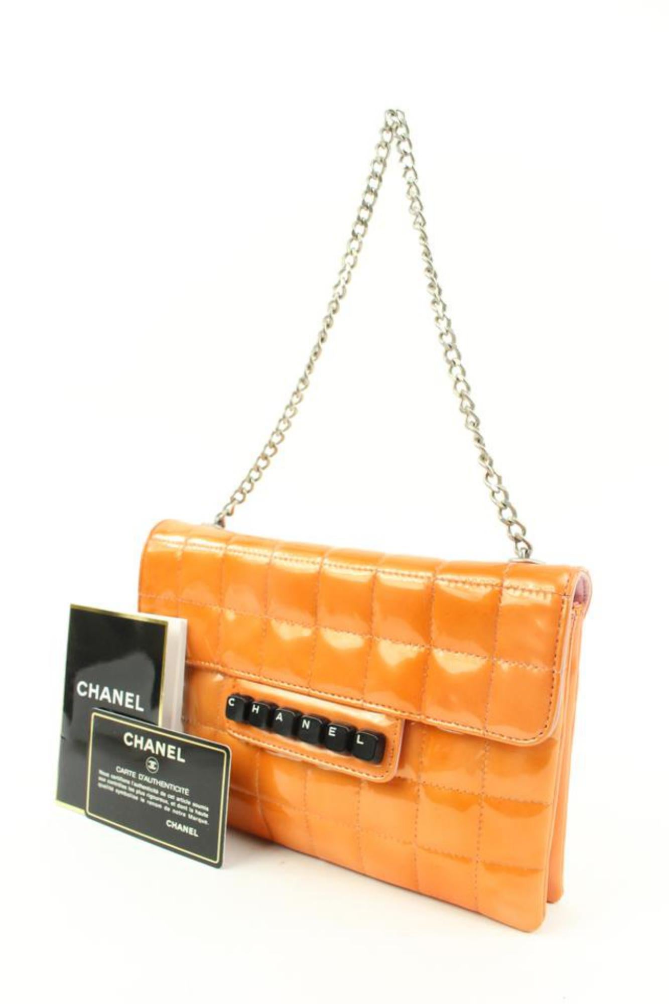 Chanel Orange Chocolate Bar Quilted Keyboard Chain Bag s210ck51
Date Code/Serial Number: 6073954
Made In: France
Measurements: Length:  8