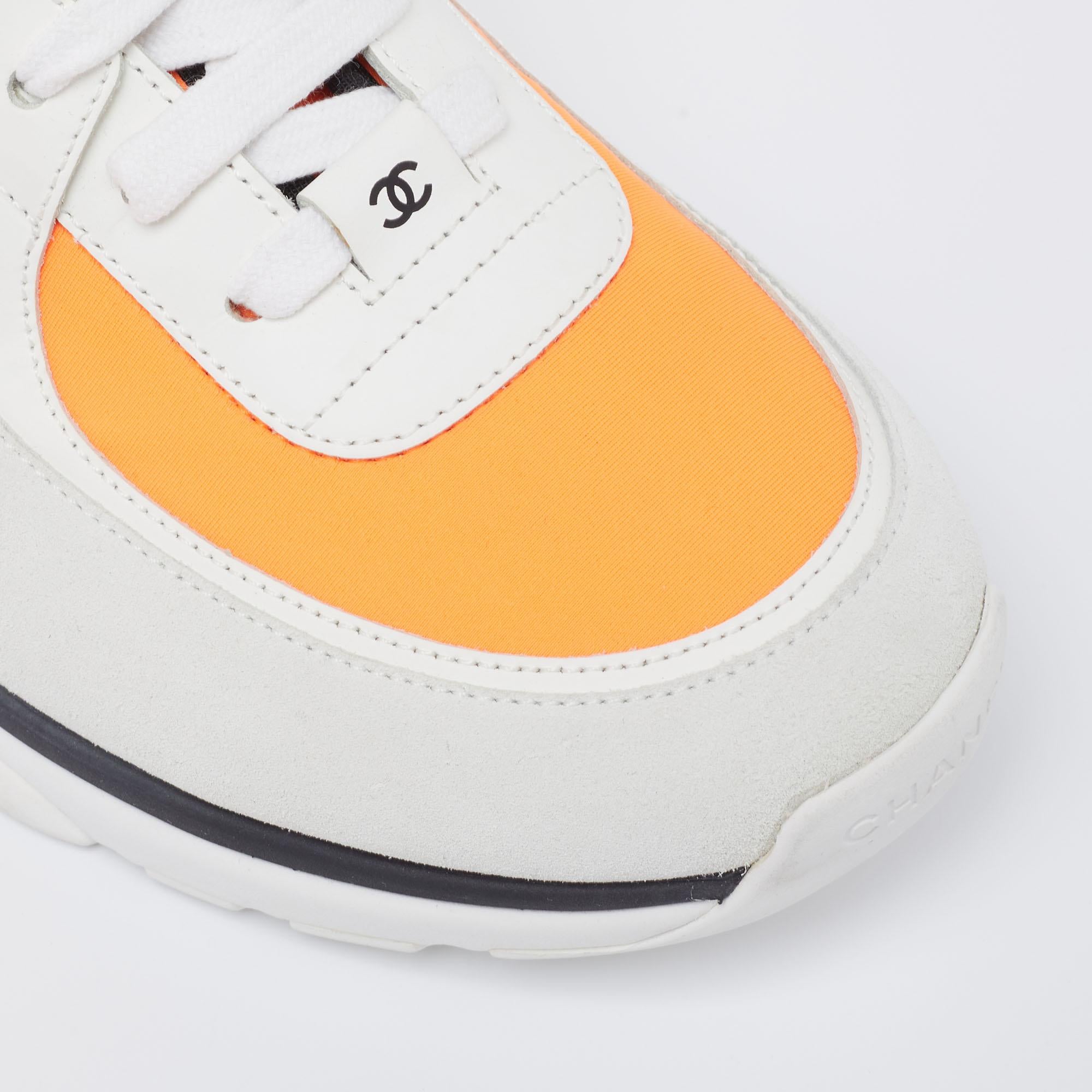 Chanel orange store high top sneakers