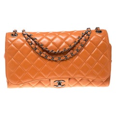 Chanel Orange Leather Drawstring Flap Shopping Bag