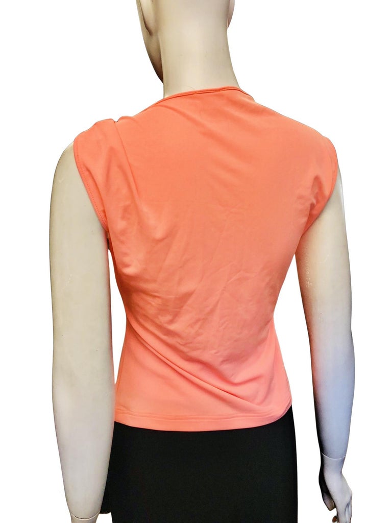 - Vintage Chanel orange nylon spandex sleeveless top from year spring 2000 collection. 

- Size 42.

- 80% Nylon, 20% Spandex. 

