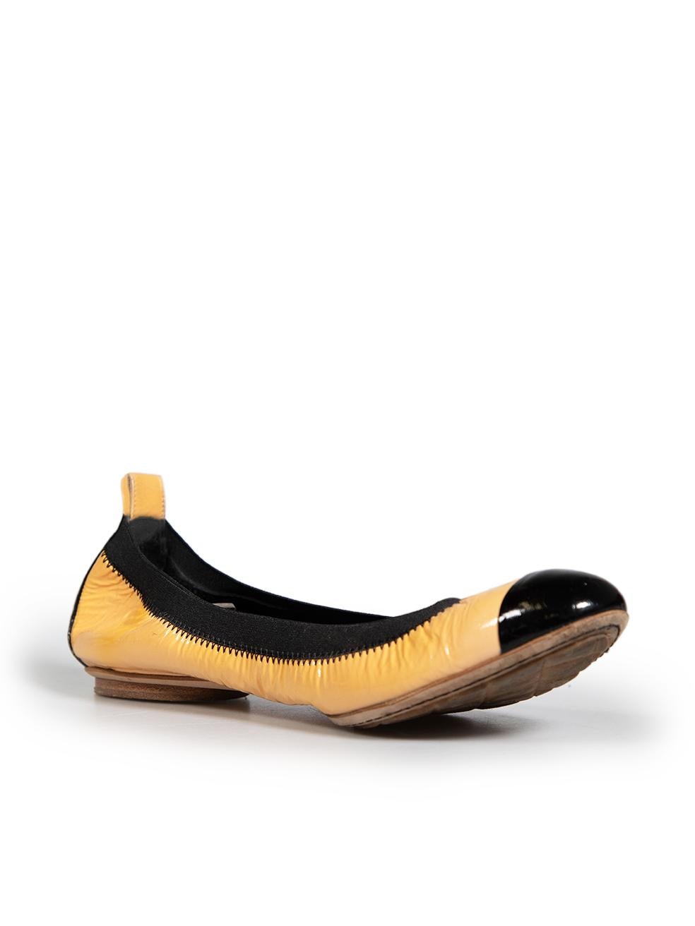 CONDITION is Very good. Minimal wear to ballet flats is evident. The coating is peeling off at the left side near the back counter of the left shoe on this used Chanel designer resale item. This item comes with dust bag and box.
 
 Details
 Orange
