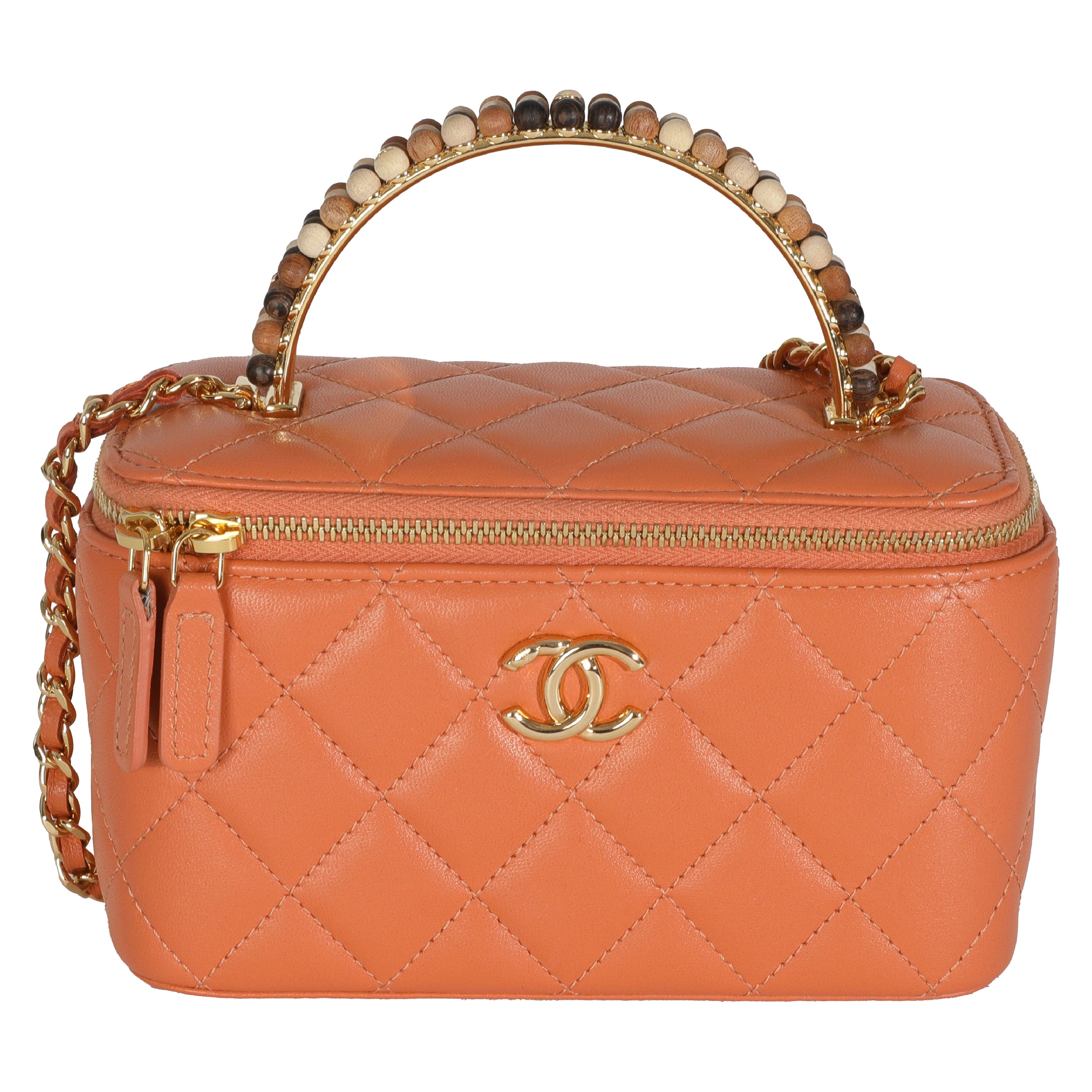 Chanel - Petit vanity case avec chaîne en cuir d
agneau matelassé et perles, orange
