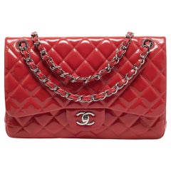 Borsa Chanel arancione trapuntata in vernice Jumbo Classic doppia patta