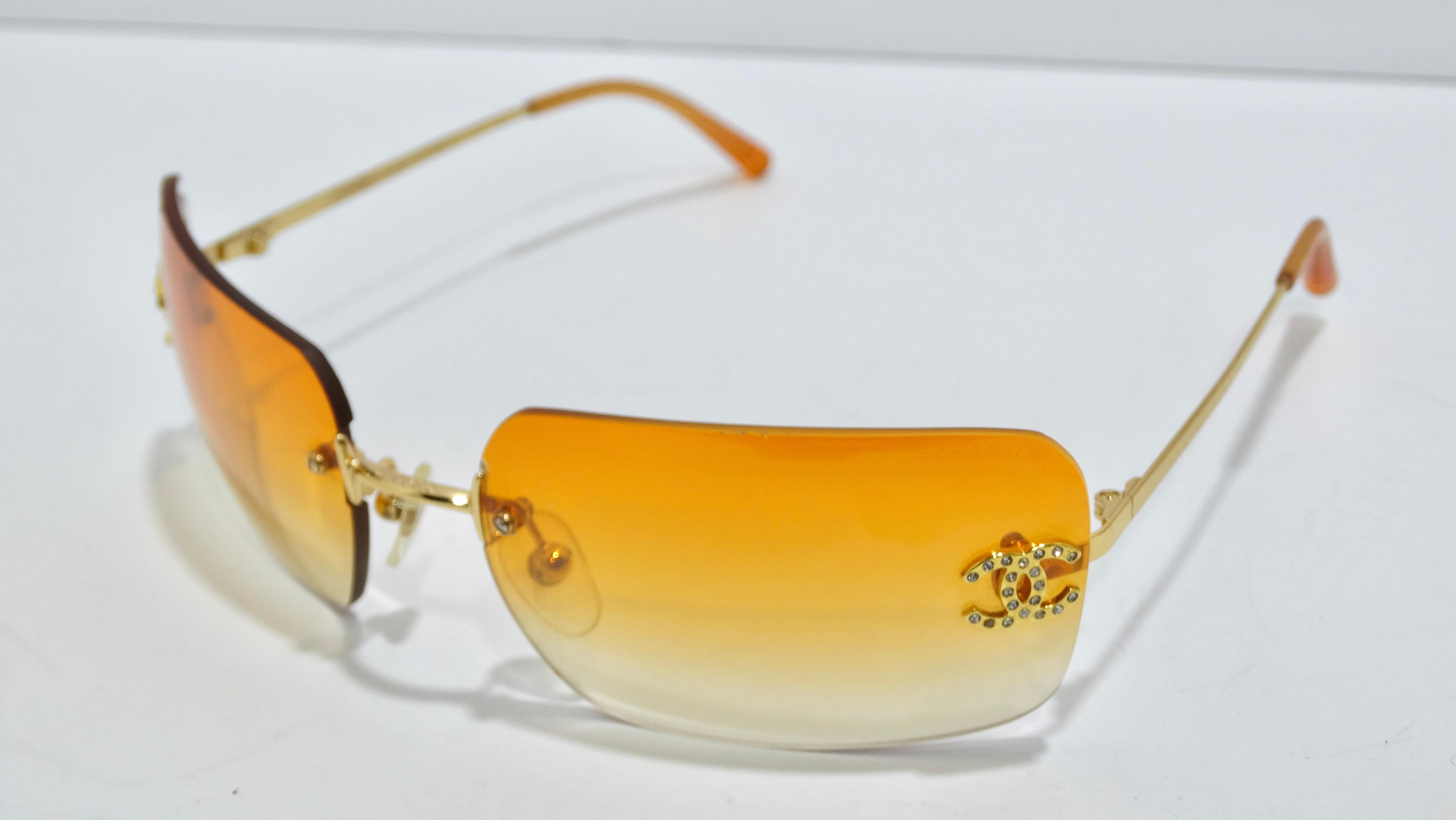 These are a 2000s Chanel gem! It doesn't get much better than this. The adorable details of these glasses can't go overlooked as they feature an orange to clear gradient lenses and the classic CC branding in rhinestones. A petite frame gives you a