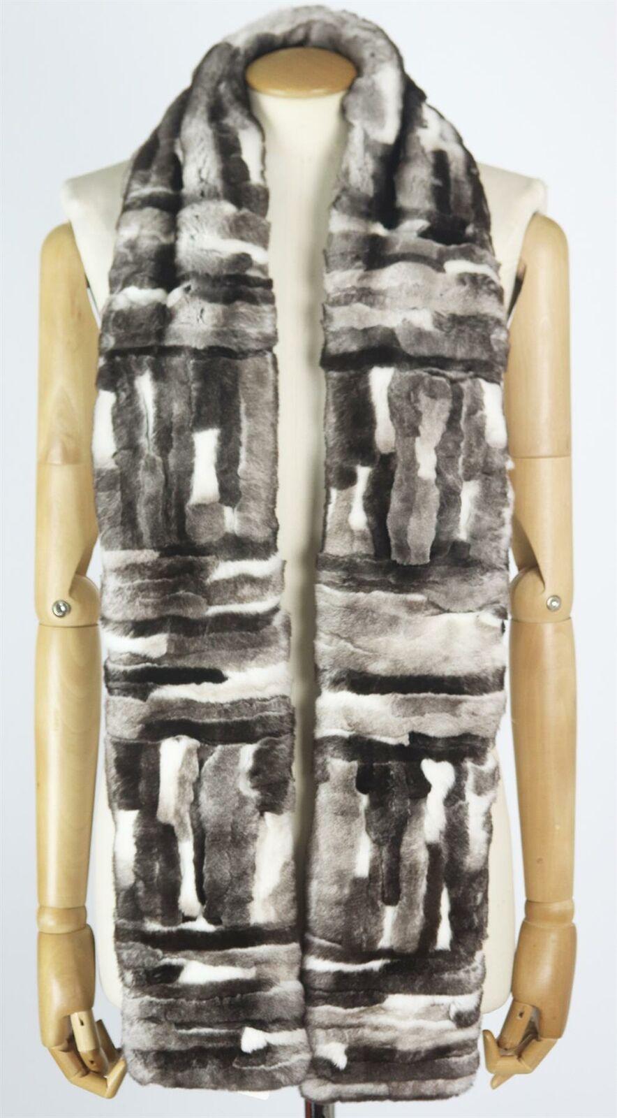 This lush, lustrous orylag and cashmere scarf features black, grey and white fur, combined with grey printed cashmere, it envelopes the wearer in pure luxury.
Black and white orylag fur, grey cashmere.
Slips on. 
100% Orylag; lining: 100%