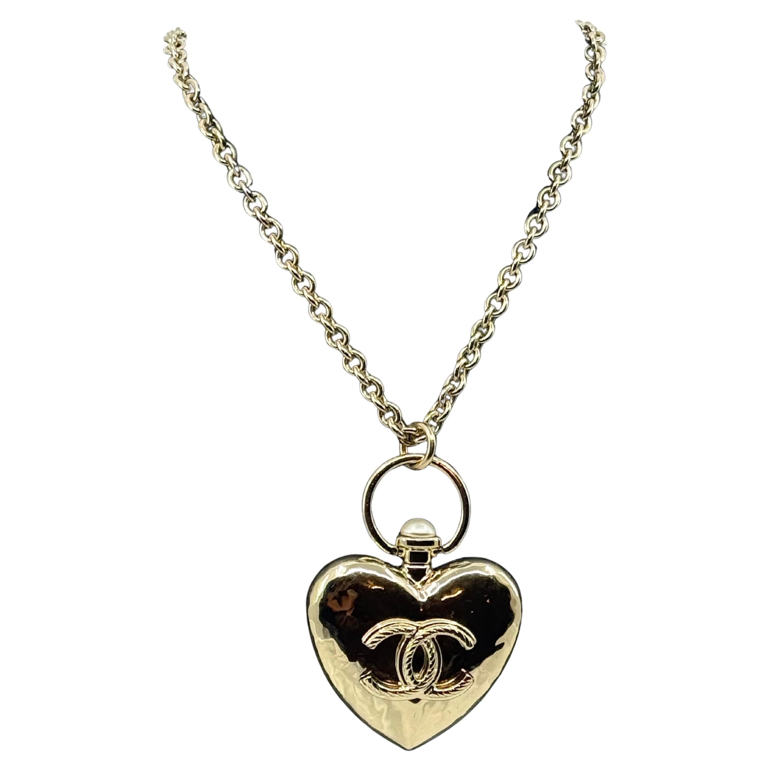 CHANEL Oversized Gold CC Logo Heart Locket Pendant Necklace For Sale