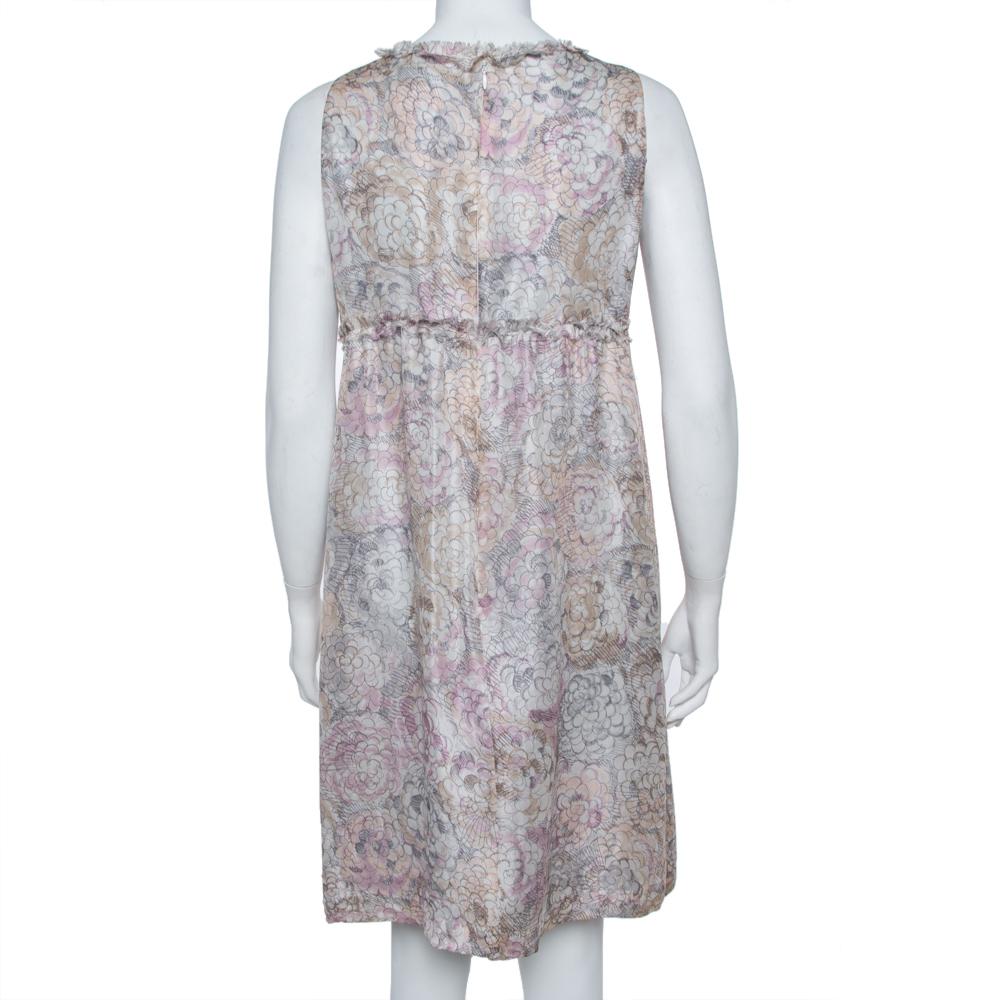 This dress from Chanel is simply stunning! It is styled as sleeveless with a floral print all over. You can wear it with flats or high heels and still look amazing.

