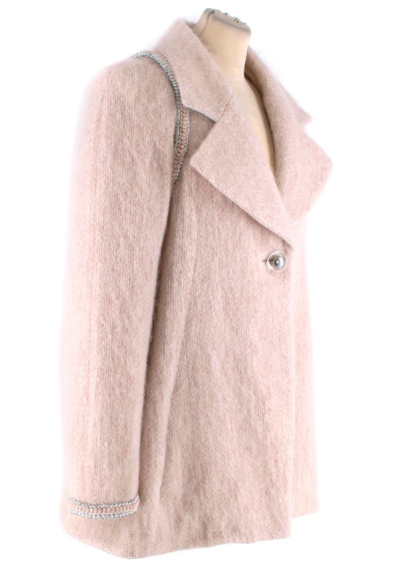  Chanel Pale Pink Mohair Blend Single Breasted Jacket with Silver Trim
 

 - Chanel jacket made from fluffy mohair and wool in a light pink shade
 - Boxy shape, with swing hem
 - Rounded notch lapel 
 - Metallic silver braid trims the shoulder seam
