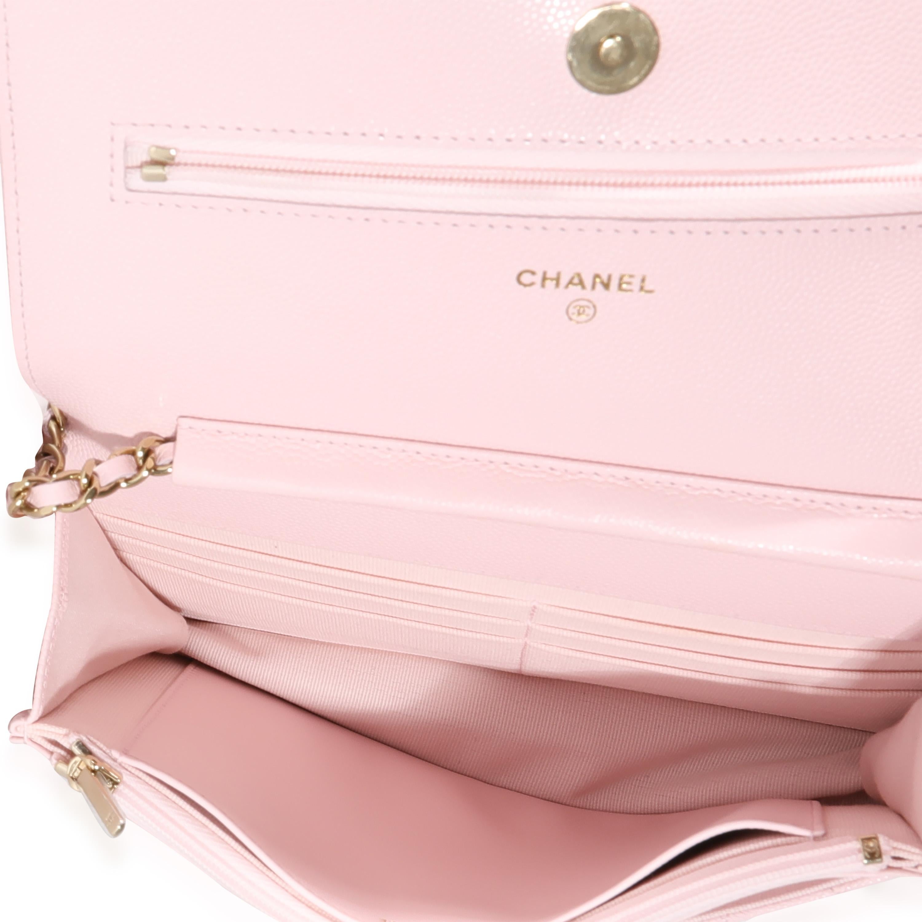 Listing Title: Chanel Pale Pink Quilted Caviar Wallet on Chain
SKU: 122038
Condition: Pre-owned 
Handbag Condition: Excellent
Condition Comments: Excellent Condition. Some plastic at hardware. Scuffing at corners. Scratching at hardware. Light marks