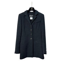 CHANEL Paris-Bombay Chaqueta de tweed negra - Talla 38